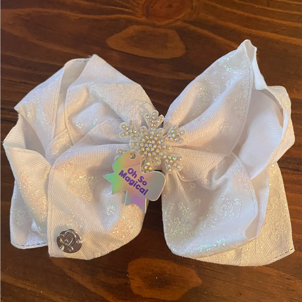 Jojo Siwa signature collection white Oh So Magical Bow hair clip.